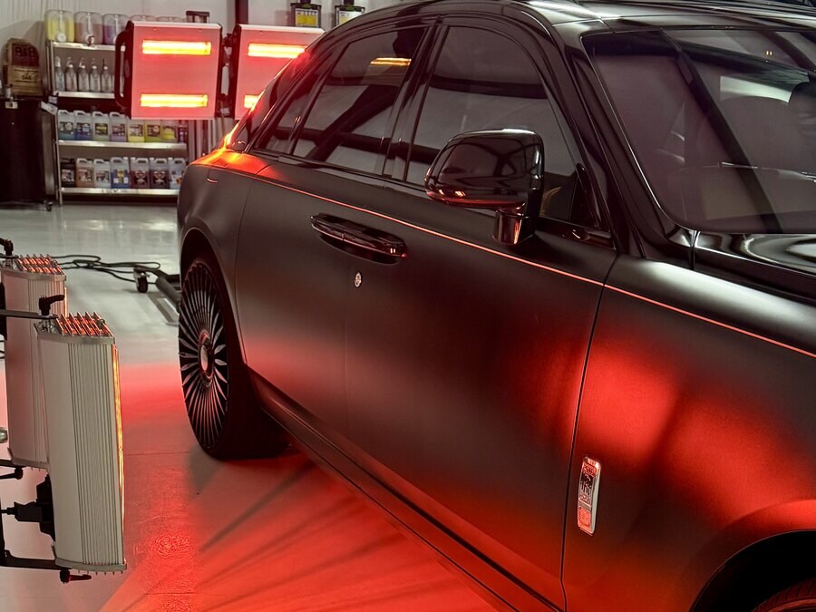 Diamond Auto Spa studio with luxury vehicles