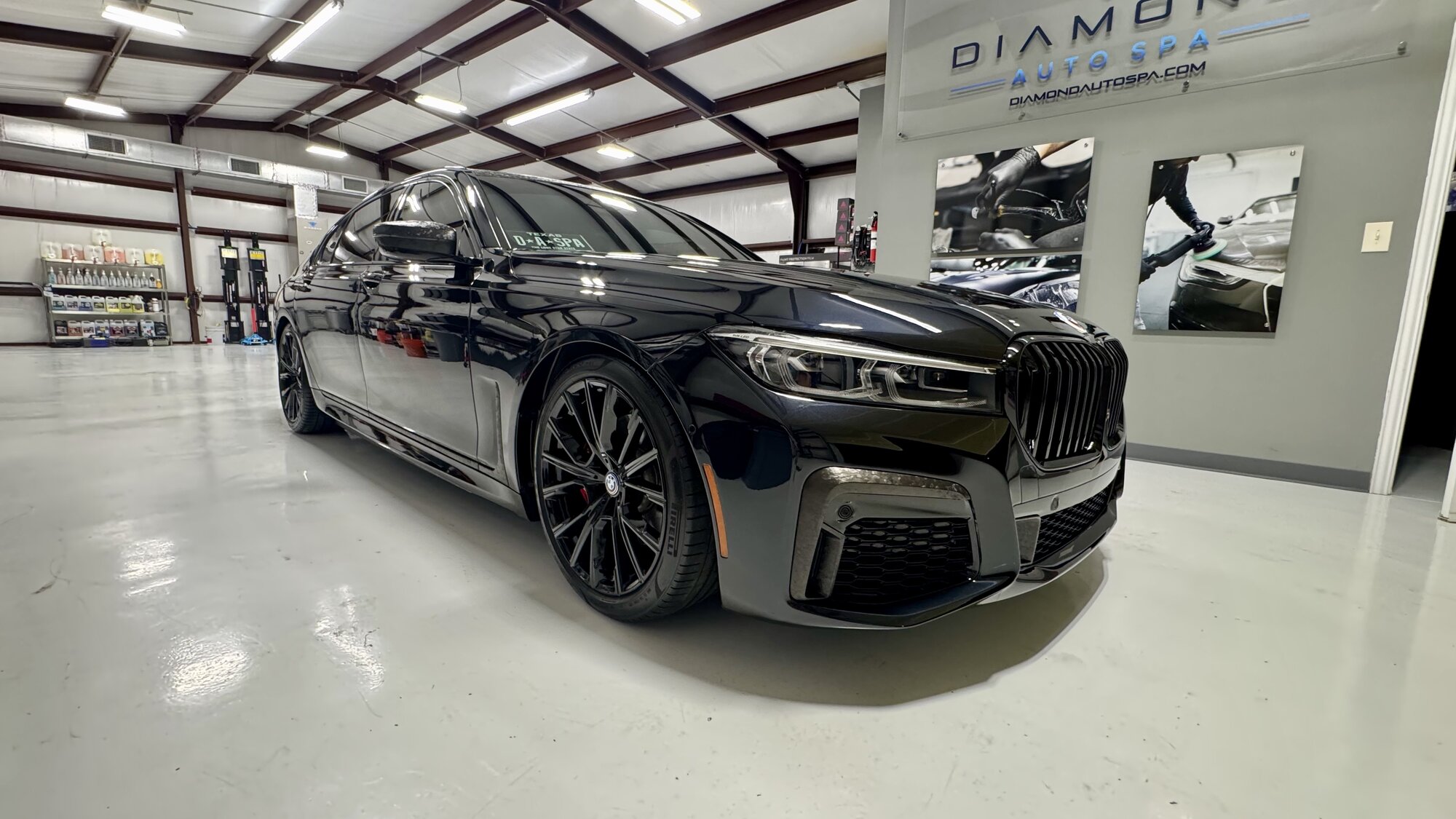 Black BMW 7 Series with ceramic coating in the studio
