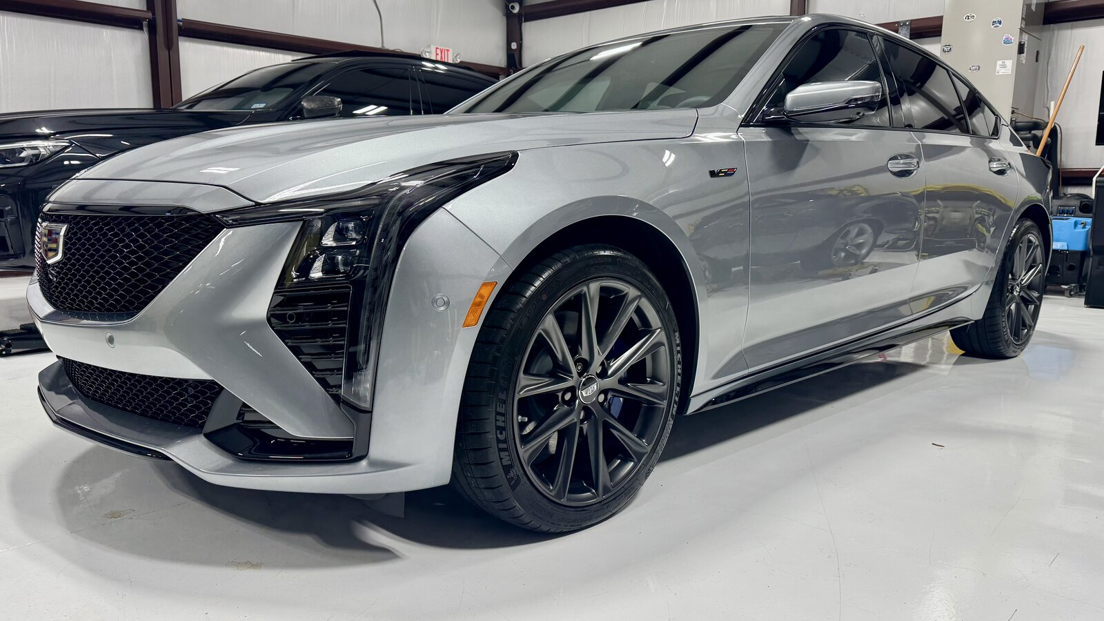 Silver Cadillac with ceramic coating in the studio