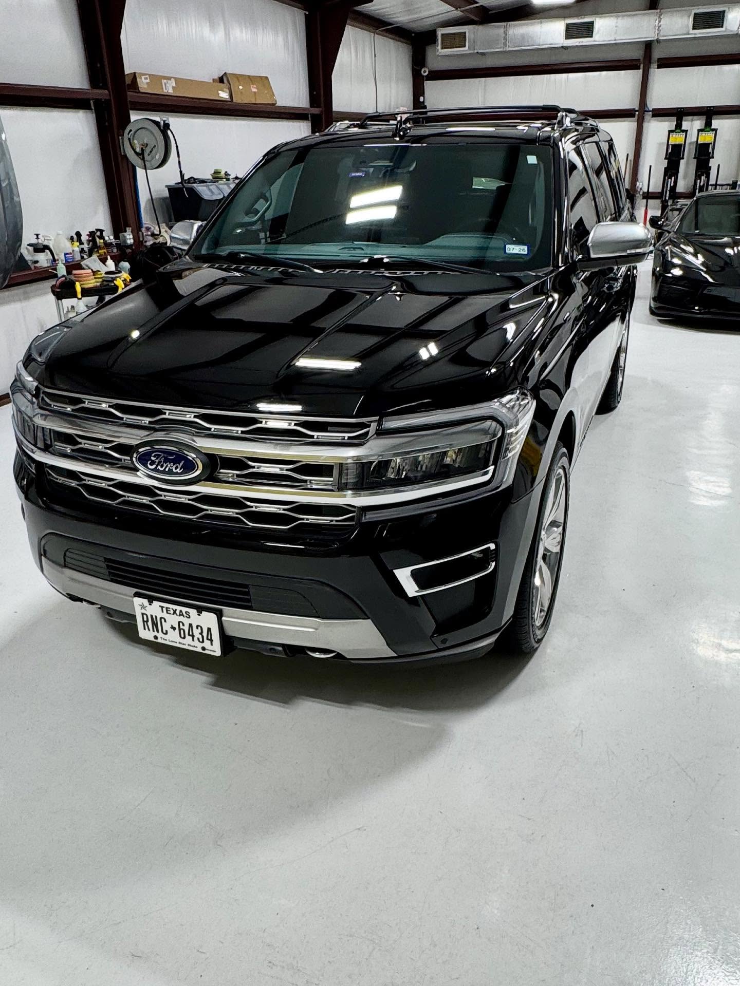 Black Ford Expedition Platinum after a Diamond full maintenance exterior detail