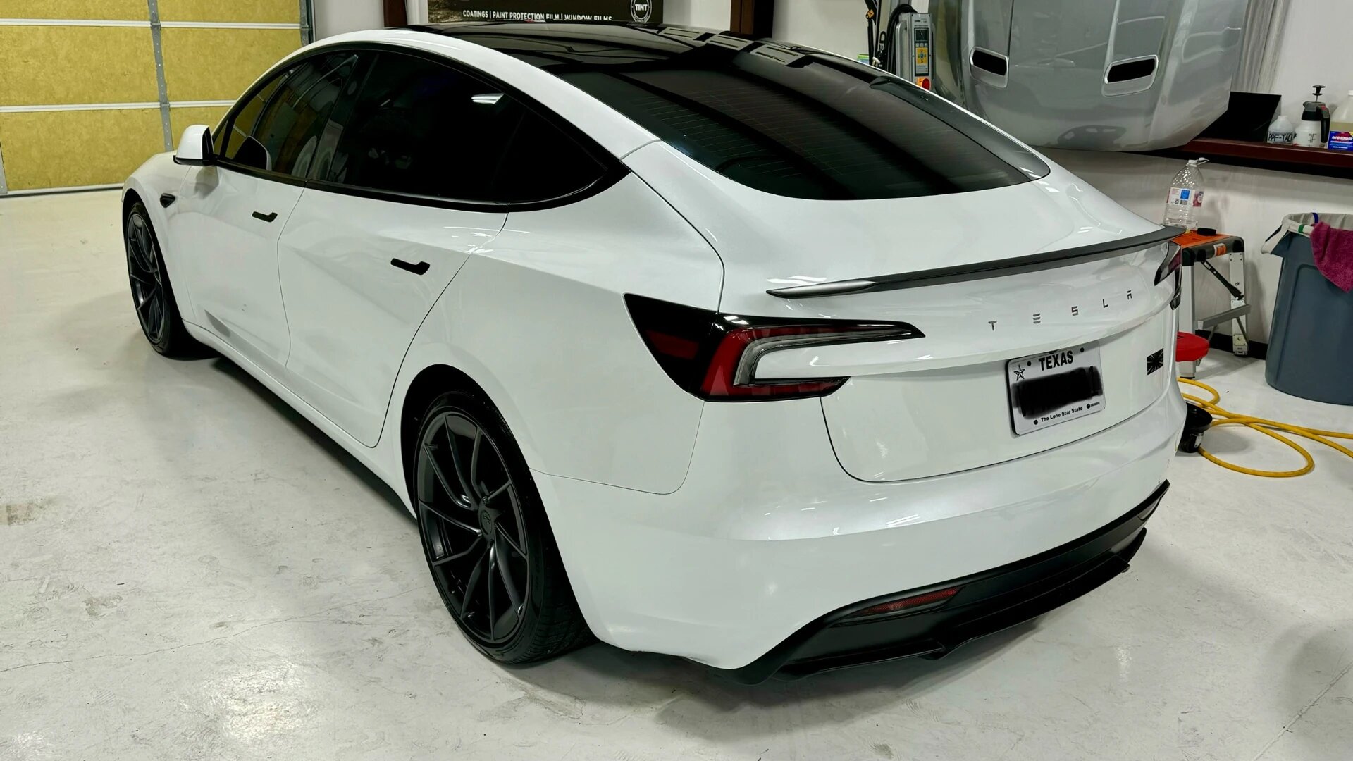 White Tesla Model 3 with ceramic window tint