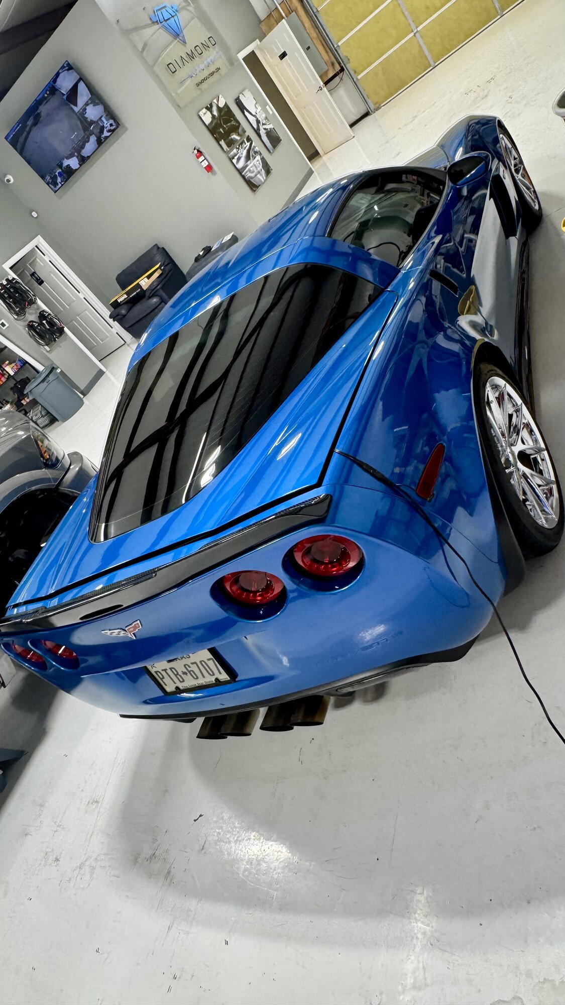 Blue Corvette Z06 after paint correction in the studio