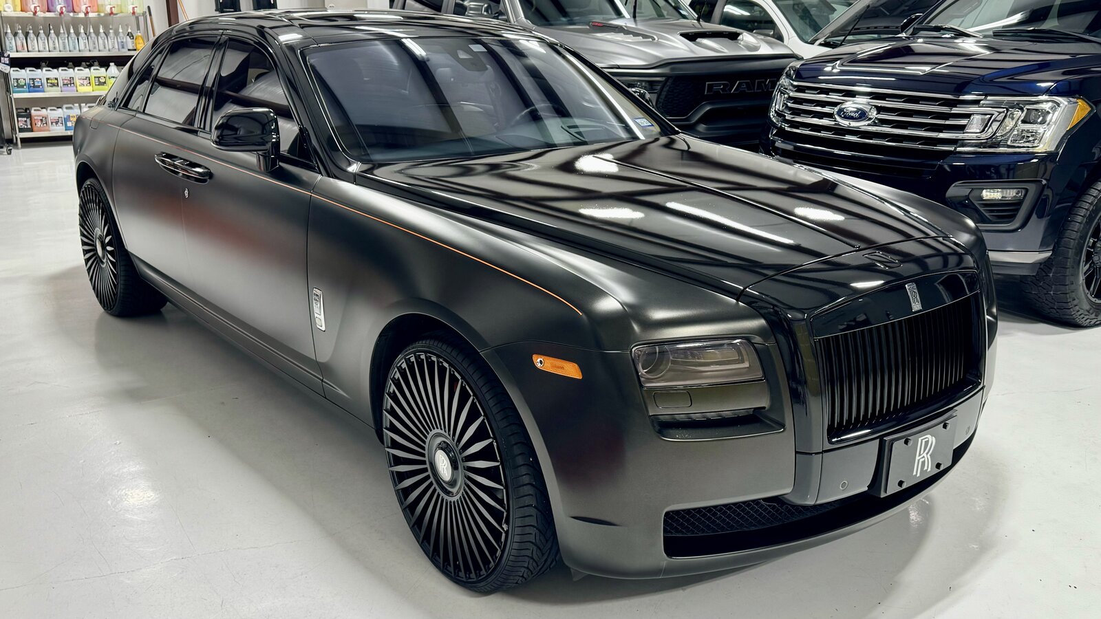 Rolls-Royce in matte black satin wrap in the studio