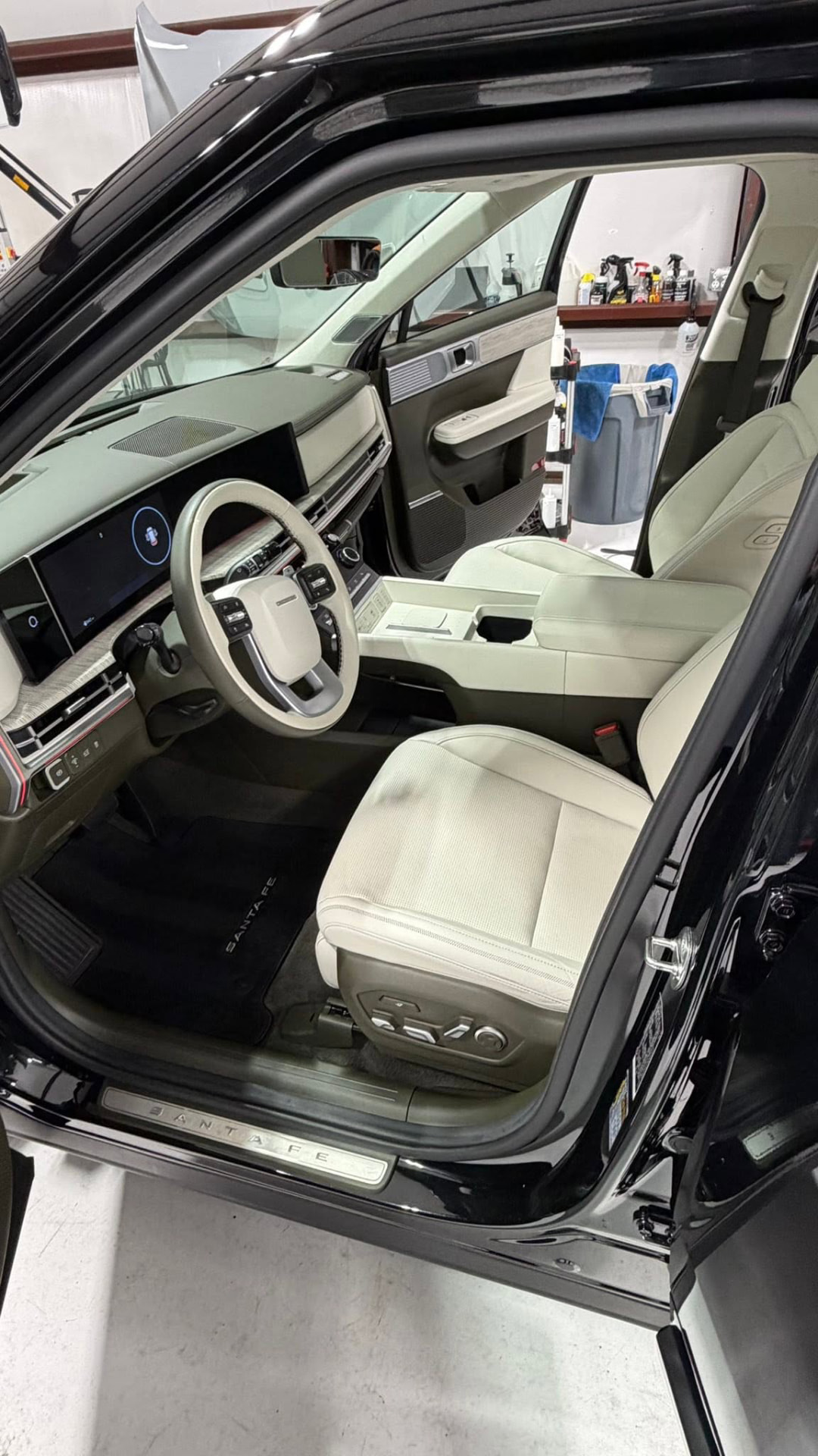 Clean cream leather interior of a black Hyundai Santa Fe after a full interior detail
